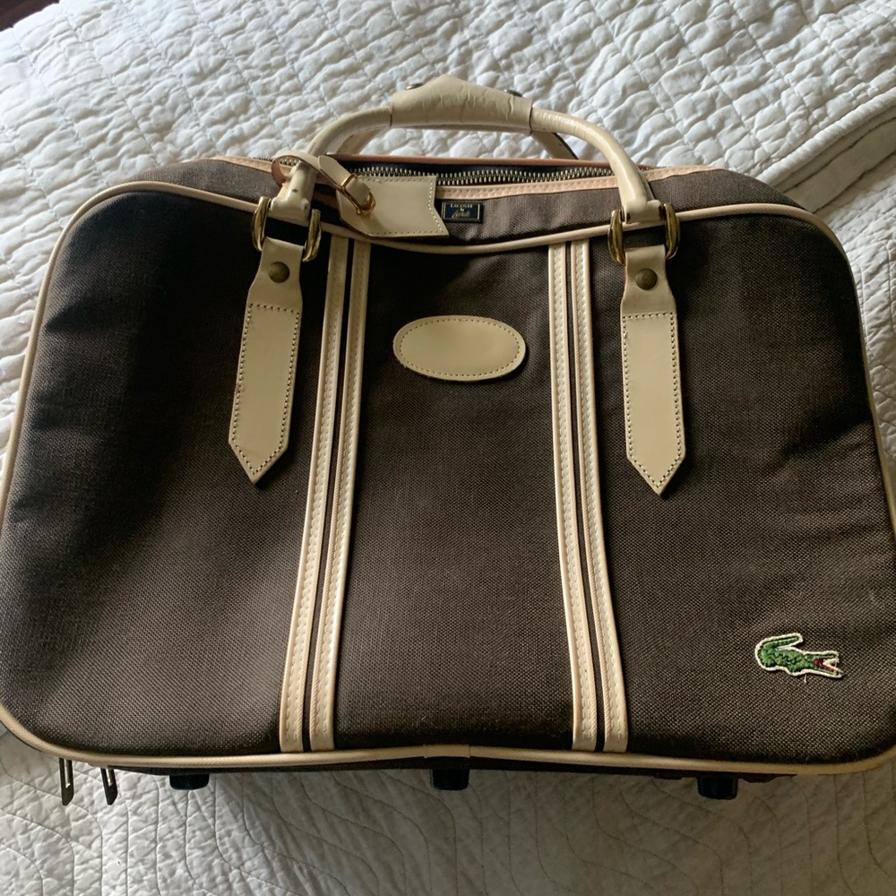 Vintage Lacoste by Lark carry on suitcase .